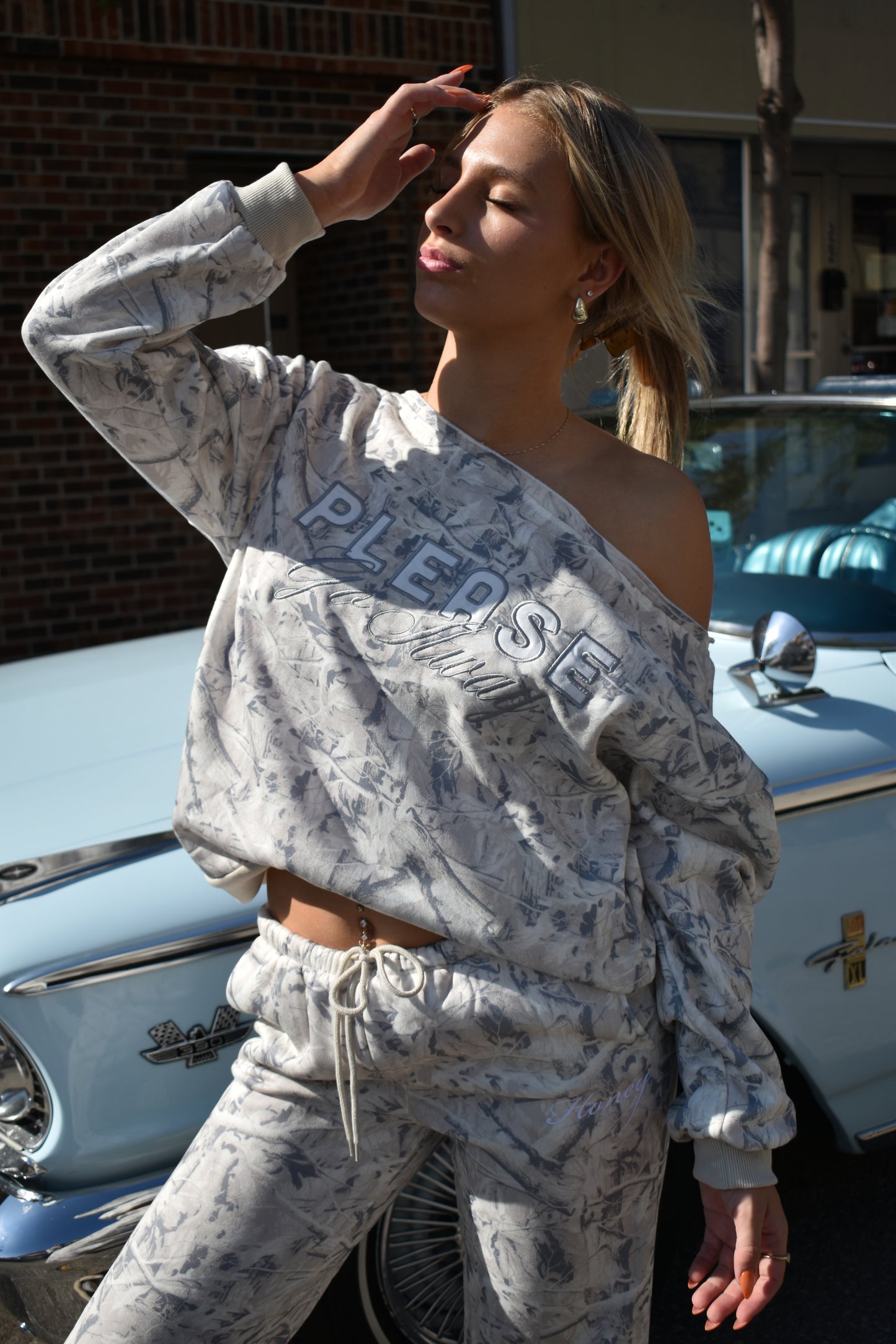 Off the shoulder "Please go away".